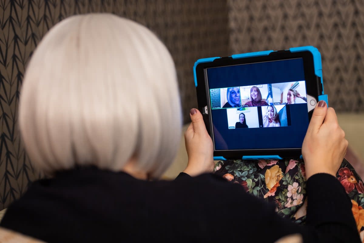 A group of women use the Zoom video conferencing application to have a group chat from their separate homes (PA) (PA Archive)