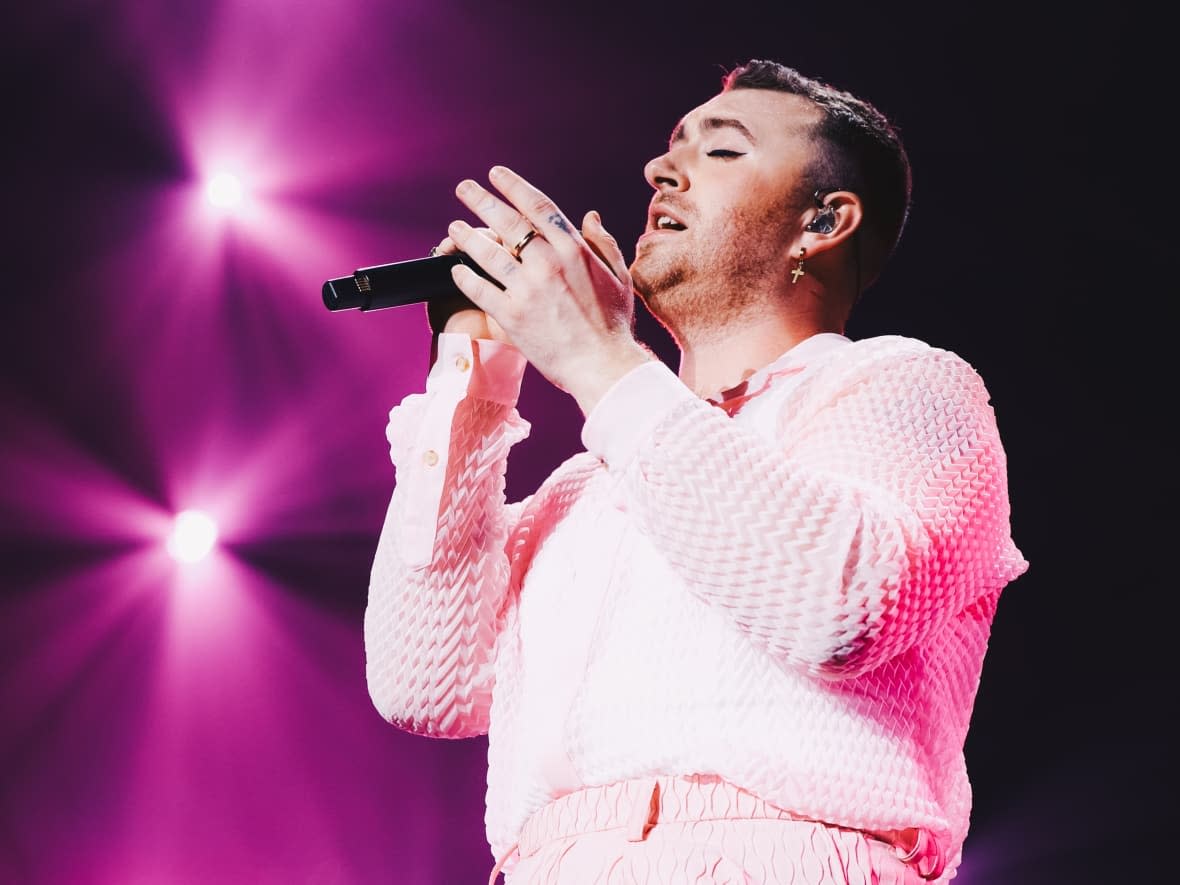 Sam Smith performs onstage during 102.7 KIIS FM's Jingle Ball at The Forum on Dec. 06, 2019 in Inglewood, Calif. The British artist, who is non-binary, was shut out of contention for the Brit Awards in 2021 due to the award show's male and female categories. (Rich Fury/Getty Images for iHeartMedia - image credit)