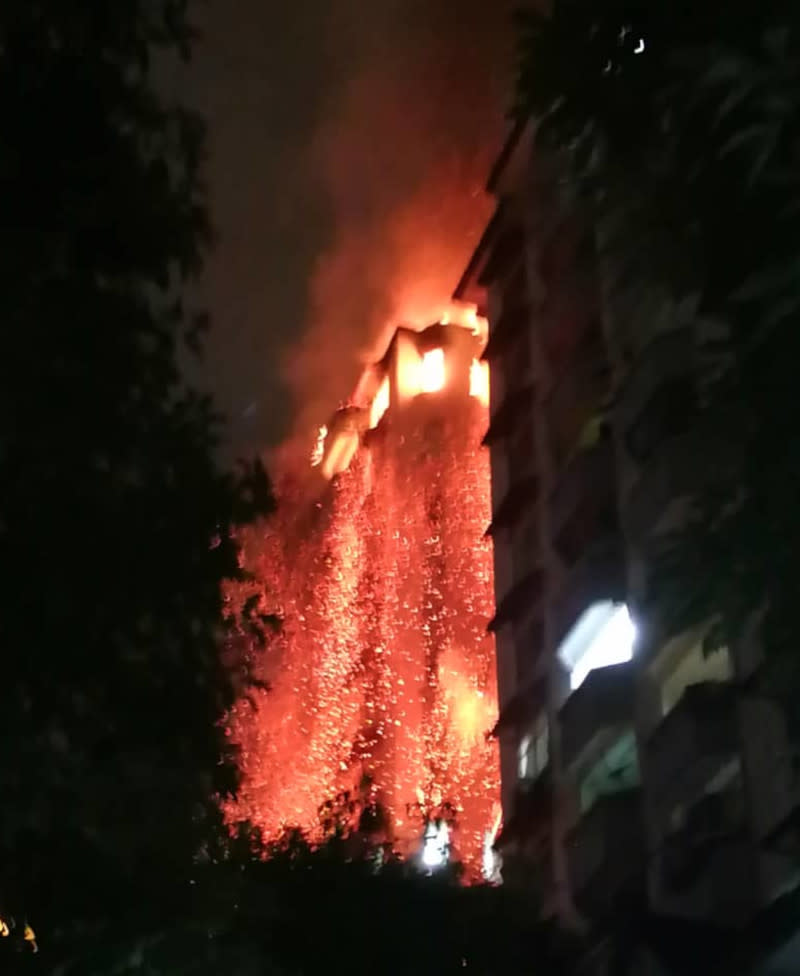 Videos of the fire posted on social media accounts showed parts of the roof collapsing, with the burning debris falling onto the ground. — Picture from Facebook