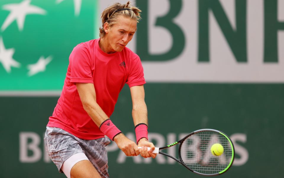 Sebastian Korda of The United States of America plays a backhand during his Men's Singles third round match against Pedro Martinez of Spain on day six of the 2020 French Open at Roland Garros on October 02, 2020 in Paris, France.  - GETTY IMAGES