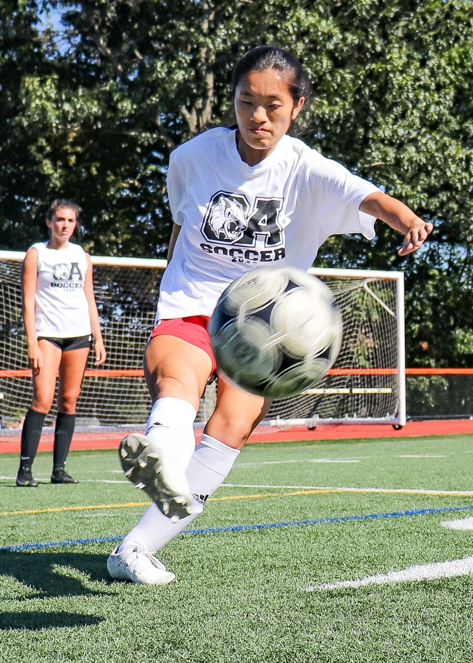 Oliver Ames' Lucinda Li Cotter drives the ball during a practice Thursday, Aug. 31, 2023.