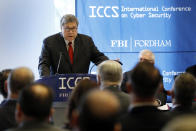 U.S. Attorney General William Barr addresses the International Conference on Cyber Security, hosted by the FBI and Fordham University, at Fordham University in New York, Tuesday, July 23, 2019. (AP Photo/Richard Drew)