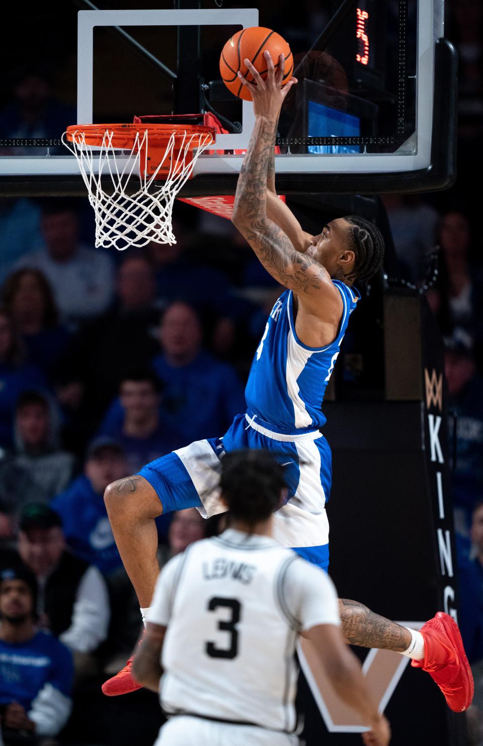 Kentucky guard Jordan Burks dunks against the Commodores during the second half.