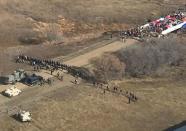 Protestors against the Dakota Access Pipeline stand-off with police in this aerial photo of Highway 1806 and County Road 134 near the town of Cannon Ball, North Dakota, U.S., October 27, 2016. Morton County Sheriff's Office/Handout via Reuters