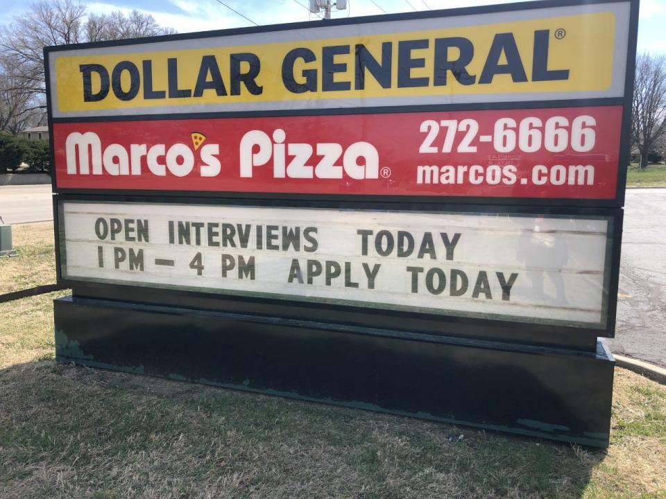 Dollar General/Marco's Pizza sign, 1401 S.W. Gage Blvd, advertises open interviews conducted daily.