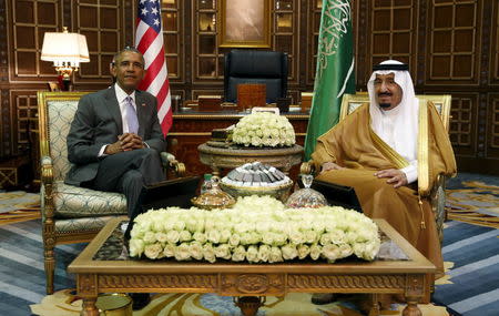 U.S. President Barack Obama meets with Saudi King Salman at Erga Palace upon his arrival for a summit meeting in Riyadh, Saudi Arabia April 20, 2016. REUTERS/Kevin Lamarque