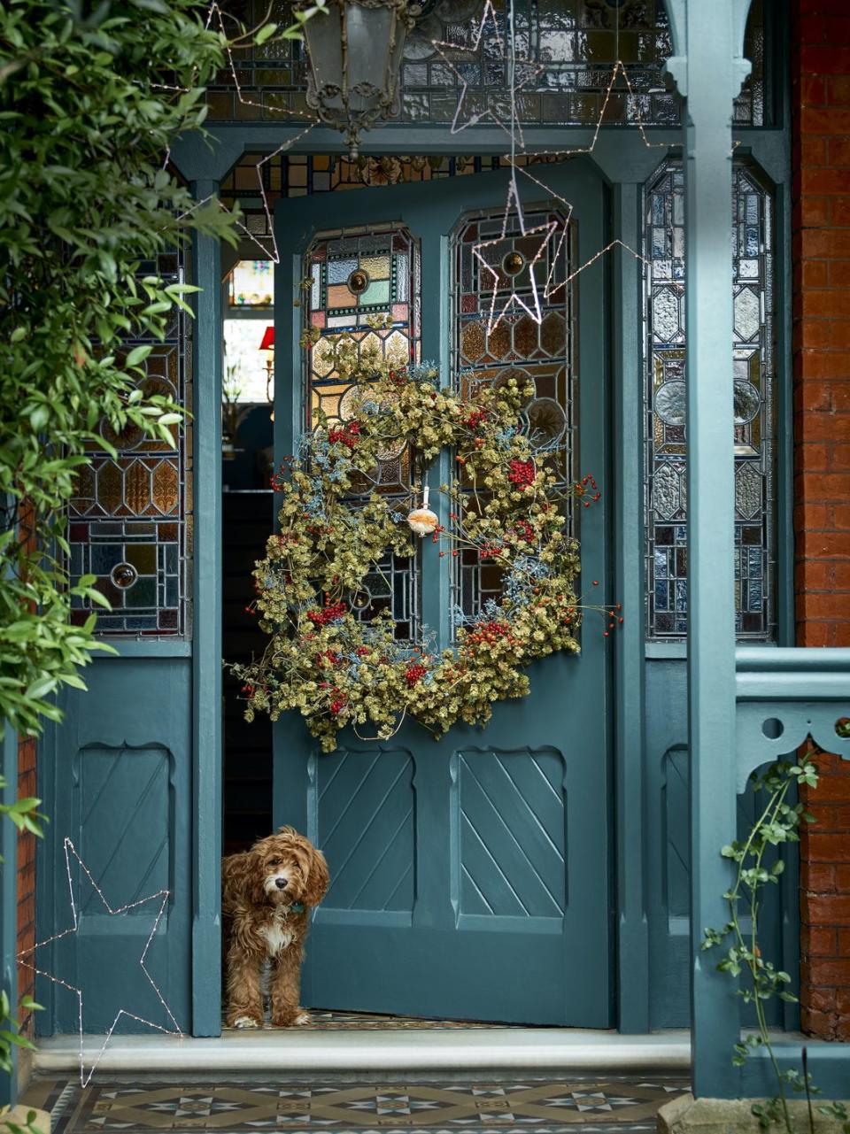 christmas front door with wreath