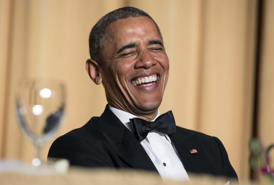 U.S. President Barack Obama laughs at a joke during the White House Correspondents' Association Dinner in Washington May 3, 2014. (REUTERS/Joshua Roberts)