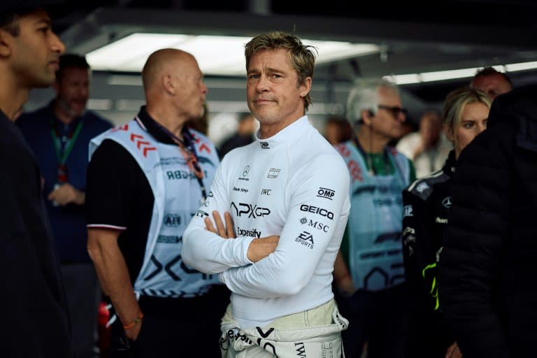 Hollywood actor Brad Pitt, acting in an upcoming Formula One-based movie, follows practice ahead of the Formula One British Grand Prix at Silverstone (BENJAMIN CREMEL)