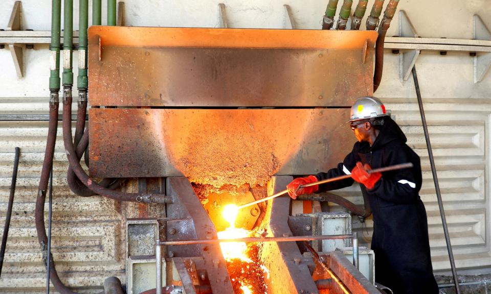 <span>A worker at Anglo American Platinum's Unki mine in Shurugwi, Zimbabwe.</span><span>Photograph: Philimon Bulawayo/Reuters</span>