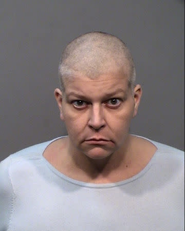 Tara Aven, 46, is seen in this booking photo, after she and her daughter Briar Aven (not shown) were booked into Yavapai County Jail on suspicion of first-degree murder and other charges, in Prescott, Arizona, U.S., April 9, 2019. Courtesy Prescott Police Department/Handout via REUTERS