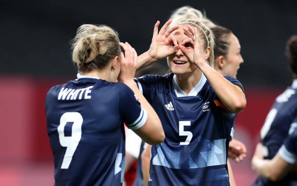Ellen White #9 of Team Great Britain celebrates with teammate Steph Houghton #5 after scoring their side's second goal during the Women's First Round Group E match between Great Britain and Chile during the Tokyo 2020 Olympic Games at Sapporo Dome on July 21, 2021 in Sapporo, Hokkaido, Japan.  - GETTY IMAGES