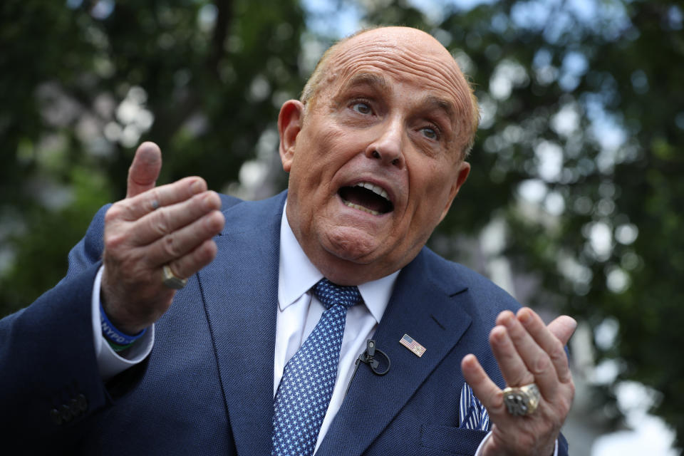 President Donald Trump's lawyer and former New York City Mayor Rudy Giuliani talks to journalists outside the White House on July 01, 2020. (Photo by Chip Somodevilla/Getty Images)