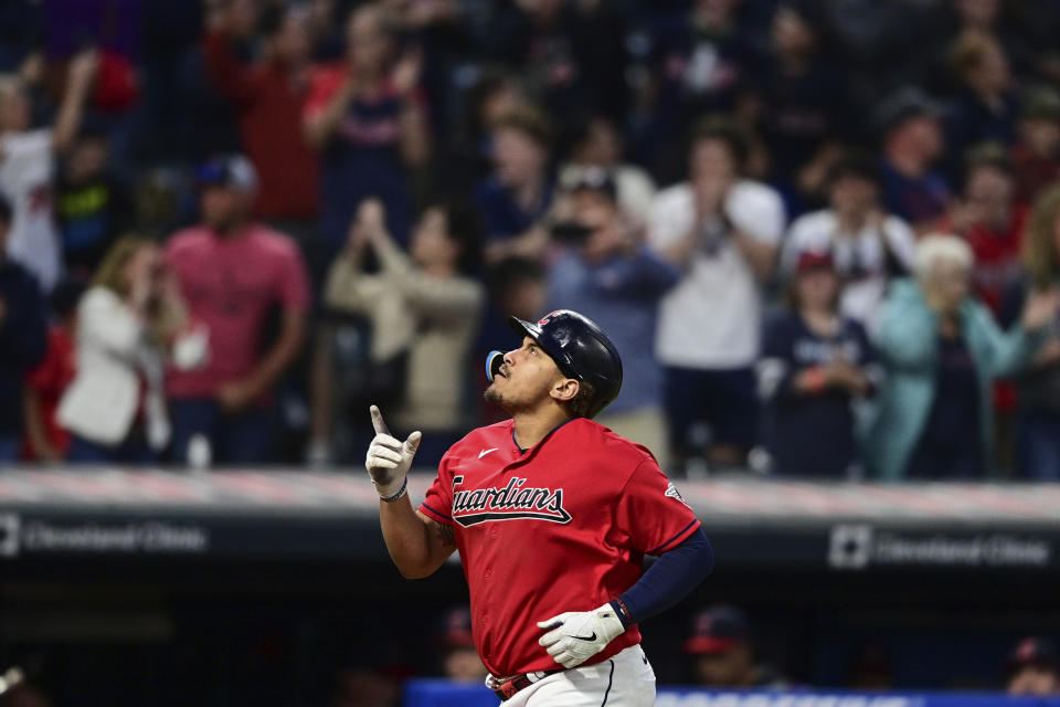 Cleveland Guardians' Josh Naylor points skyward while running the bases after hitting a three-run home run off Los Angeles Angels relief pitcher Ryan Tepera during the eighth inning of a baseball game, Saturday, May 13, 2023, in Cleveland. The Guardians won 8-6. (AP Photo/David Dermer)