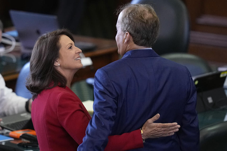 Texas state Attorney General Ken Paxton, right, is hugged by his wife State Sen. Angela Paxton, R-McKinney before the impeachment trial for Texas Attorney General Ken Paxton in the Senate Chamber at the Texas Capitol, Tuesday, Sept. 5, 2023, in Austin, Texas. (AP Photo/Eric Gay)