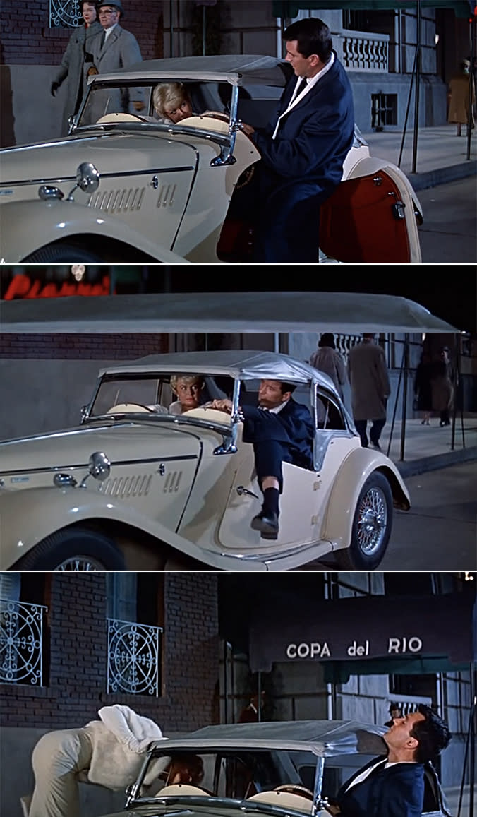 Rock Hudson trying to cram into a car with Doris Day, but he's so big that he has to hang his leg out the window