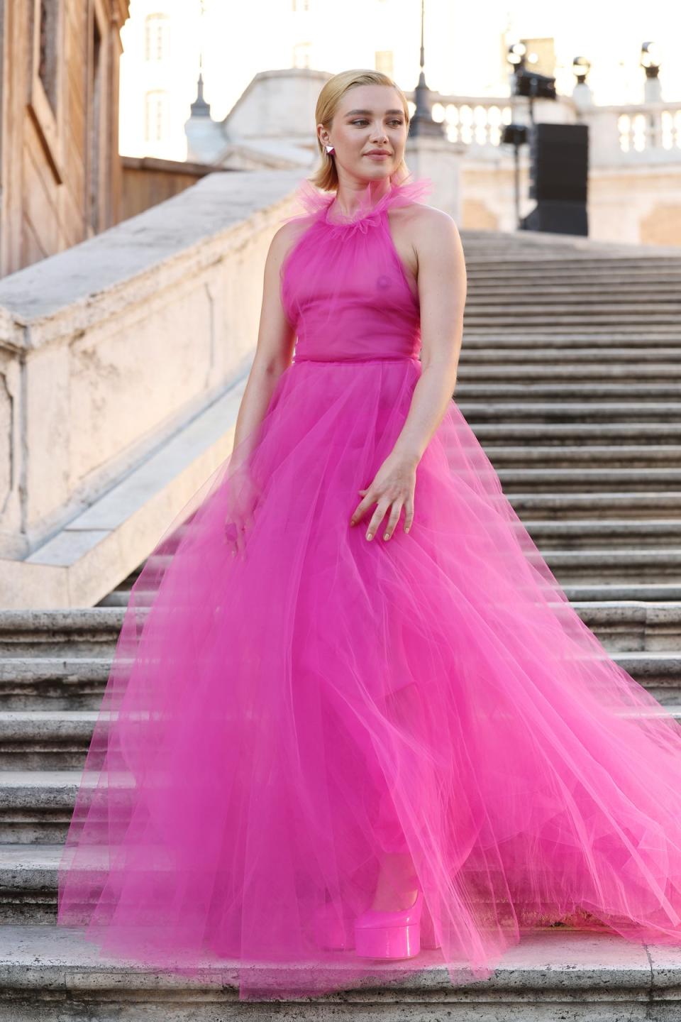 Florence Pugh attends the Valentino Couture show in Paris wearing a pink tulle dress with a sheer top (Getty Images)