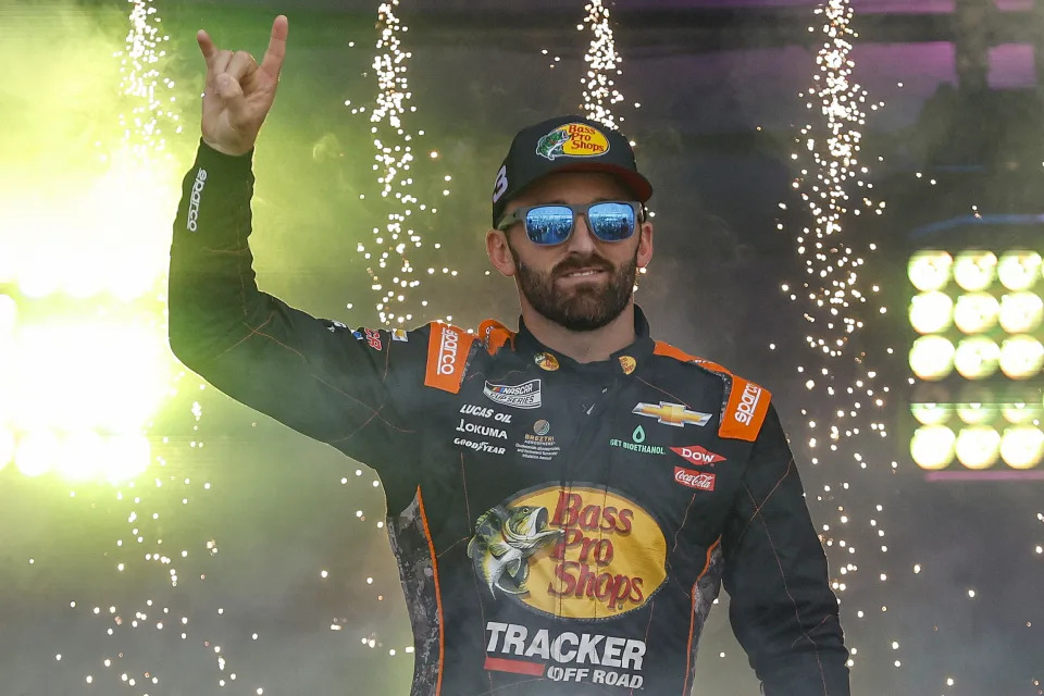 RICHMOND, VIRGINIA - AUGUST 11: Austin Dillon, driver of the #3 Bass Pro Shops Chevrolet, waves to fans as he walks onstage during driver intros prior to the NASCAR Cup Series Cook Out 400 at Richmond Raceway on August 11, 2024 in Richmond, Virginia. (Photo by Sean Gardner/Getty Images)