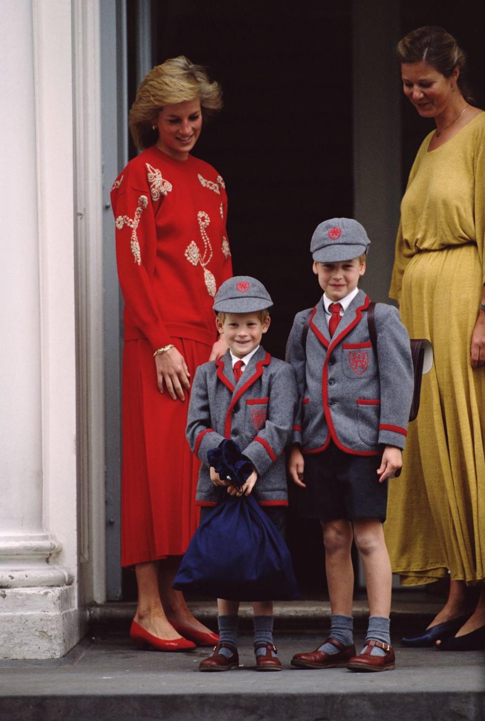 <p>Prince William joins his younger brother for his first day of school. The two give the press a smile as they enter and, of course, are accompanied by their mother Princess Diana. </p>