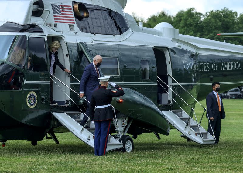 U.S. President Joe Biden and first lady Jill Biden arrive at the White House in Washington