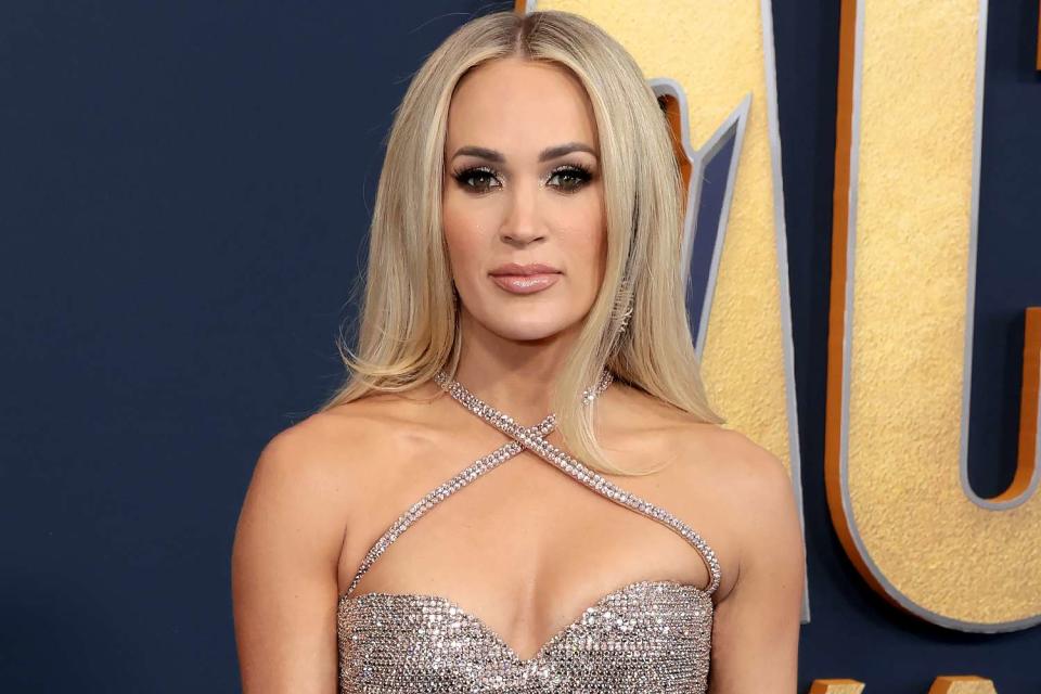 <p>Jason Kempin/Getty</p> Carrie Underwood at the ACM Awards at Allegiant Stadium on March 7, 2022 in Las Vegas
