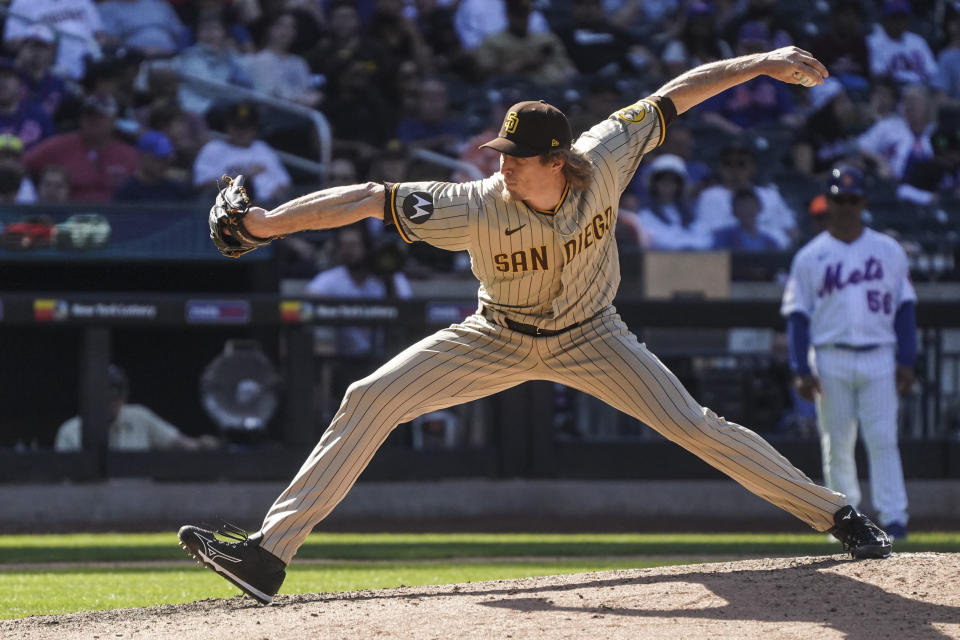 San Diego Padres Tim Hill pitches during the 8th inning of a baseball game against New York Mets, Wednesday, April 12, 2023, in New York. (AP Photo/Bebeto Matthews)