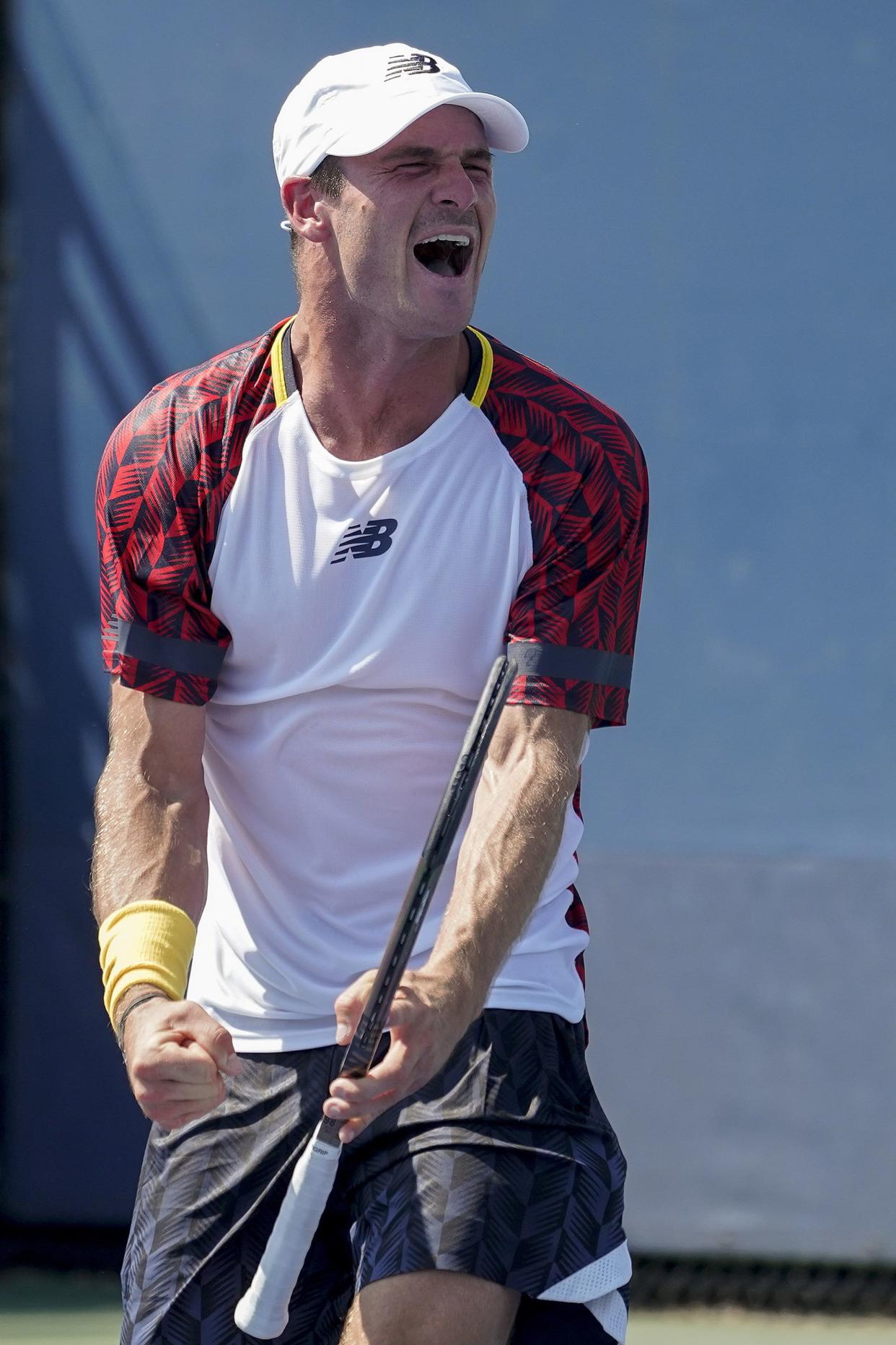 Tommy Paul, of the United States, reacts after defeating Bernabe Zapata Miralles, of Spain, during the first round of the U.S. Open tennis championships, Monday, Aug. 29, 2022, in New York.