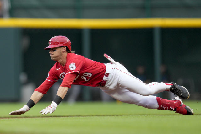 Cincinnati Reds left fielder Stuart Fairchild (17) leaves the