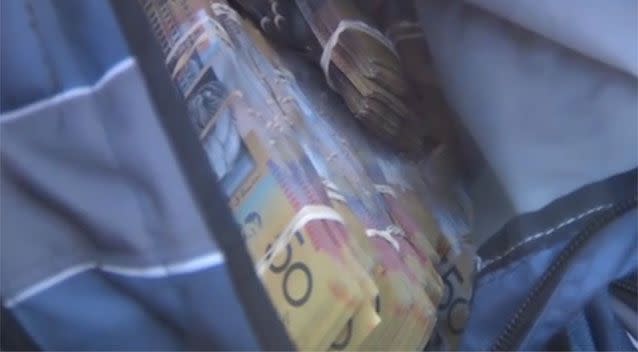 Cash, two vehicles and a baton were among the items seized. Source: NSW Police.