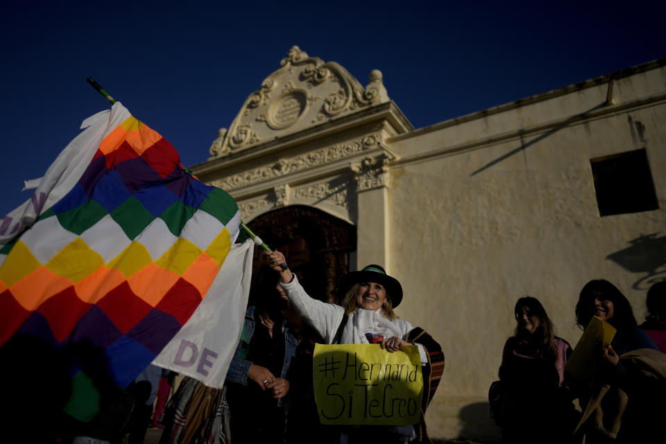 Women protest outside the San Bernardo Convent, in support of the eighteen cloistered nuns from the convent who have made a formal allegation against the Archbishop Mario Cargnello of Salta and two other members of the church for alleged physical and psychological gender violence, in Salta, Argentina, Tuesday, May 3, 2022. (AP Photo/Natacha Pisarenko)