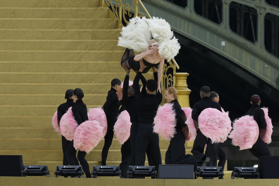 Lady Gaga performs in Paris, France, ahead the opening ceremony of the 2024 Summer Olympics, Friday, July 26, 2024. (AP Photo/Luca Bruno)