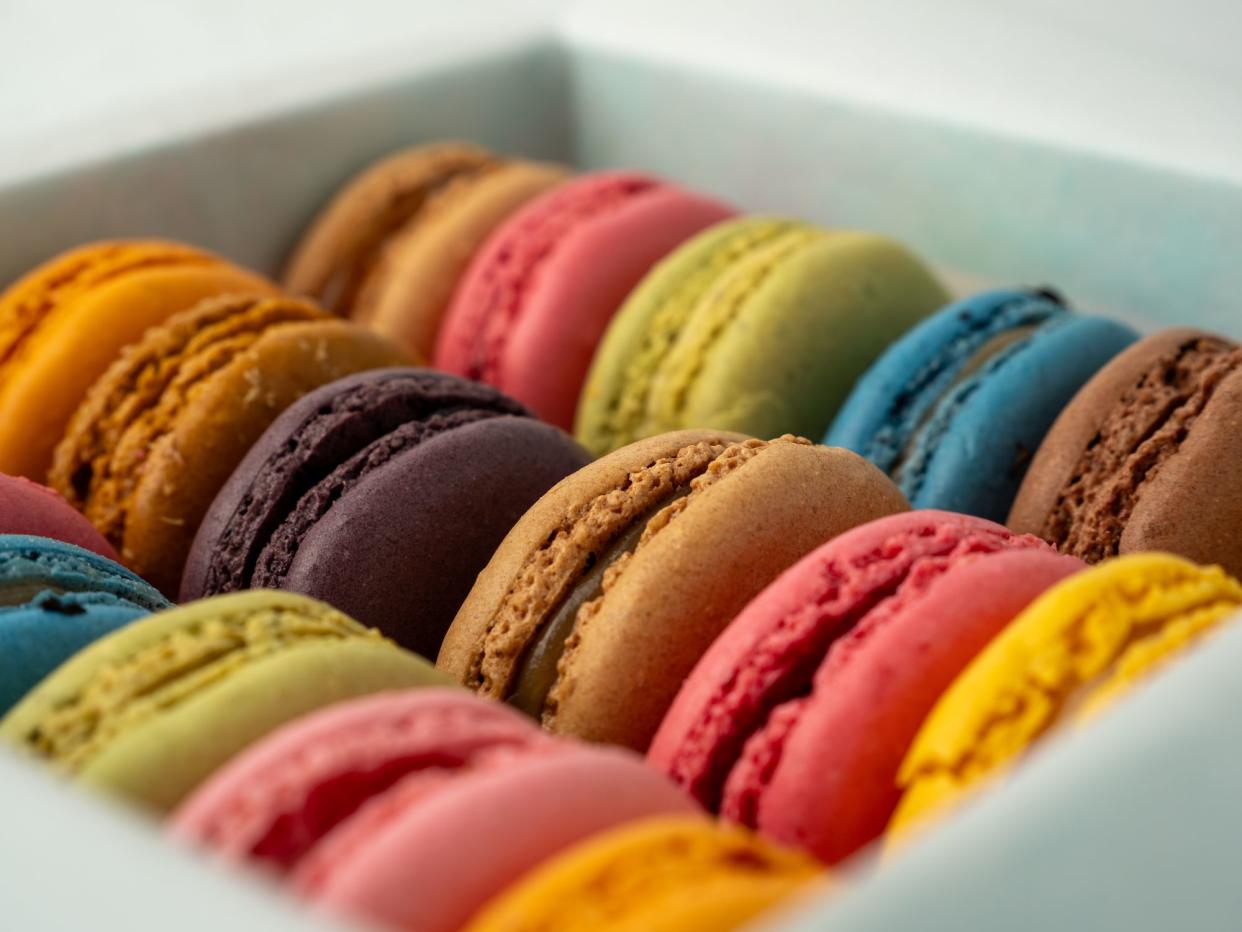 Colorful French macarons packaging. Close-up of French macarons.