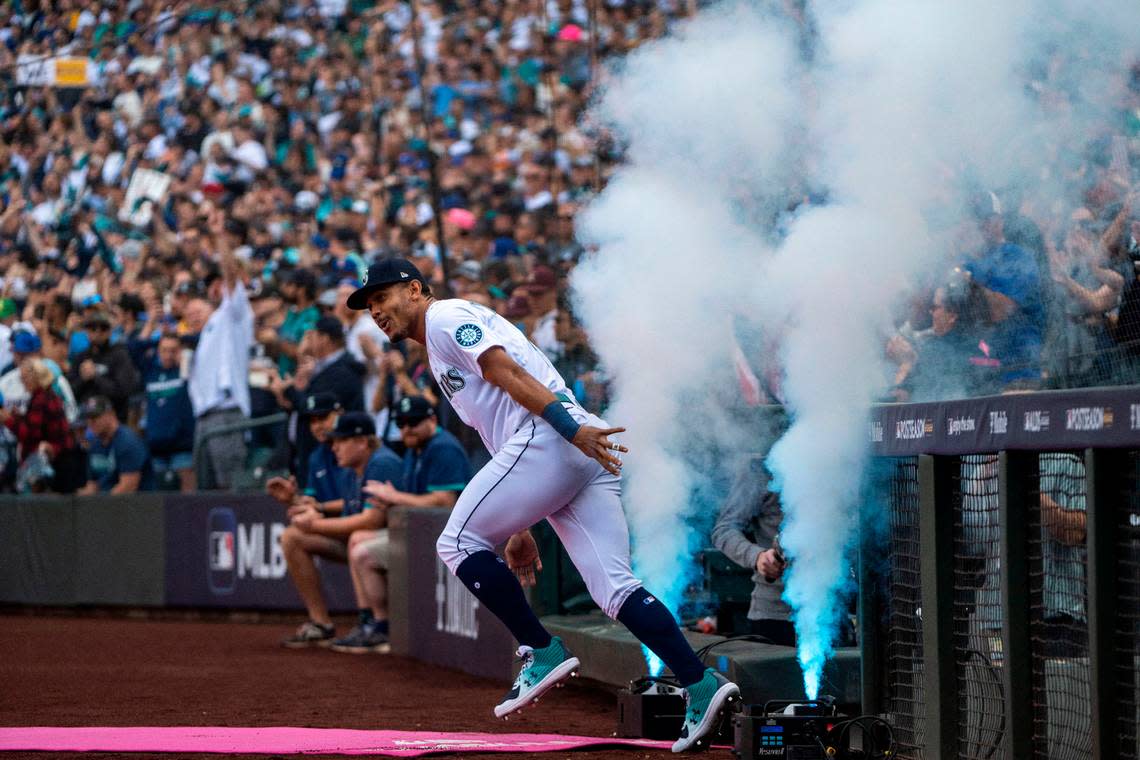 Seattle Mariners center fielder Julio Rodriguez (44) is introduced prior to the start of game 3 of the ALDS against the Houston Astros on Saturday, Oct. 15, 2022, at T-Mobile Park in Seattle.