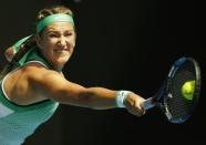 Belarus' Victoria Azarenka stretches for a shot during her quarter-final match against Germany's Angelique Kerber at the Australian Open tennis tournament at Melbourne Park, Australia, January 27, 2016. REUTERS/Issei Kato