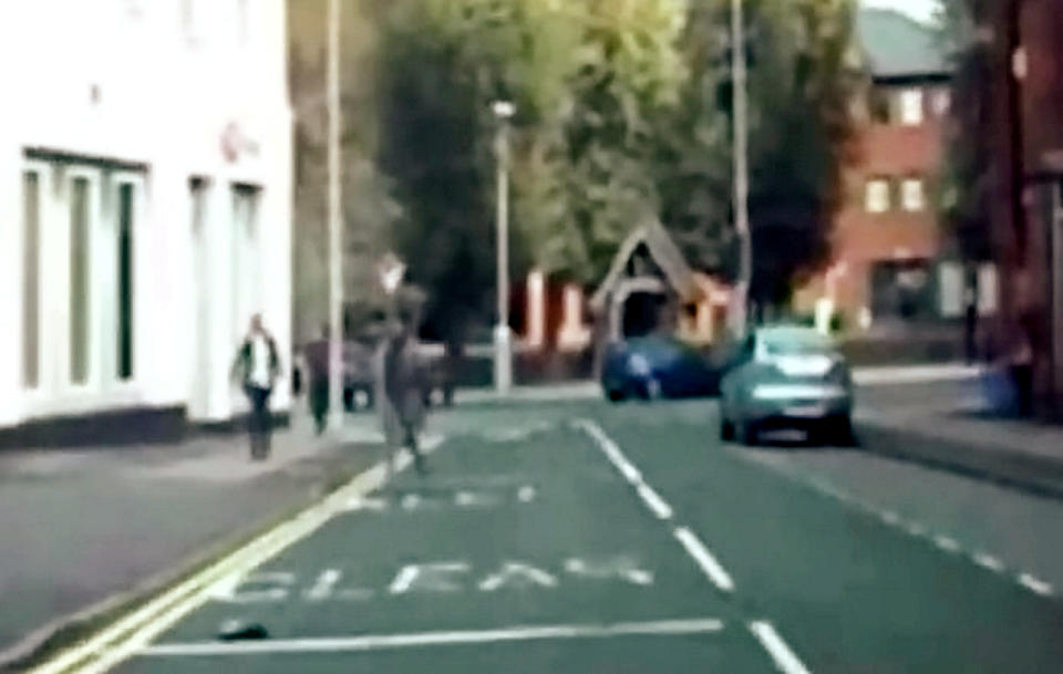 Shocking footage shows robber dragging woman along a road after stealing her car