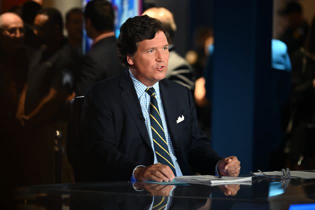 Tucker Carlson, shown here in November at the Fox Nation Patriot Awards in Florida, was let go from Fox News last week.