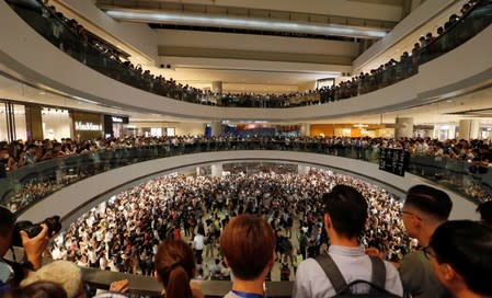 People gather during a protest at International Finance Center (IFC) in Hong Kong