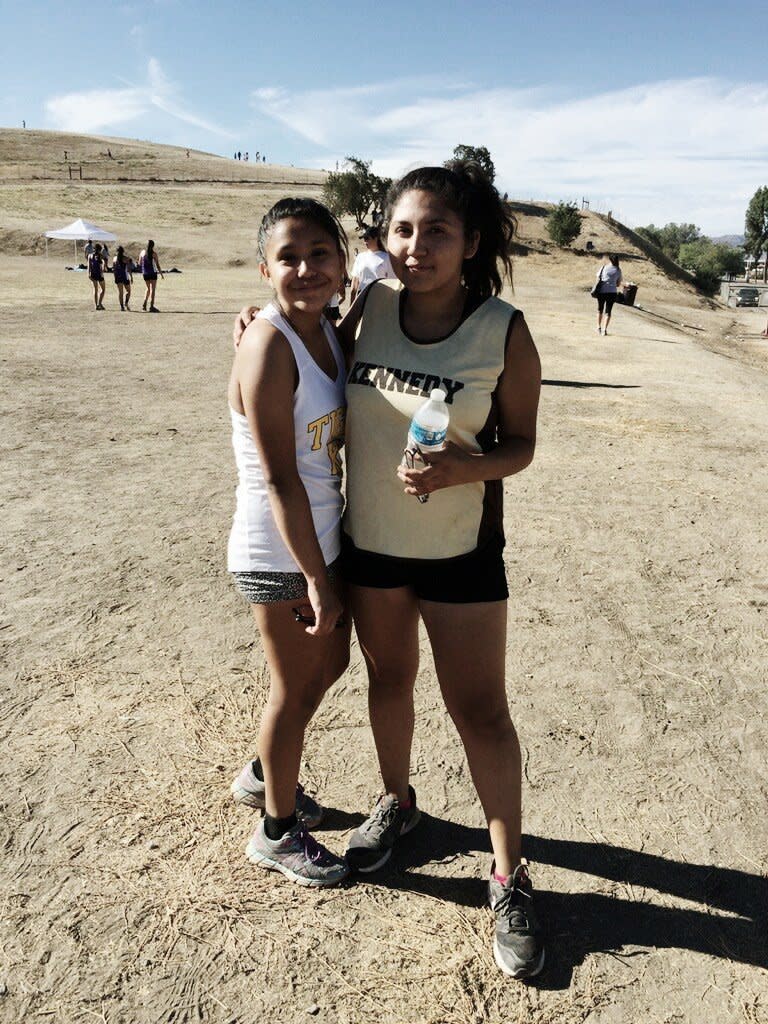 Citlaly Ortega, right, with her friend Reanna Casarez at a cross-country meet&nbsp;in&nbsp;October 2016. (Photo: Citlaly Ortega)