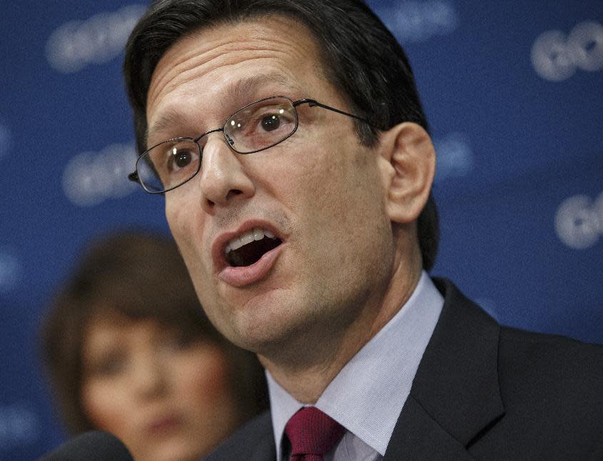 FILE - This Jan. 14, 2014 file photo shows House Majority Leader Eric Cantor of Va. speaking on Capitol Hill in Washington. Flip sides of the same campaign-season coin, the Republican drive in Congress to repeal the nation’s health care law and the Democratic call to close the pay gap for women have much in common. Divided government assures that neither has even a remote chance of becoming law anytime soon. Instead, they figure prominently in rival strategies to maximize turnout in the fall _ Democrats hoping women will vote in huge numbers, while Republicans try to stoke election year enthusiasm among tea party activists and other conservatives. (AP Photo/J. Scott Applewhite, File)