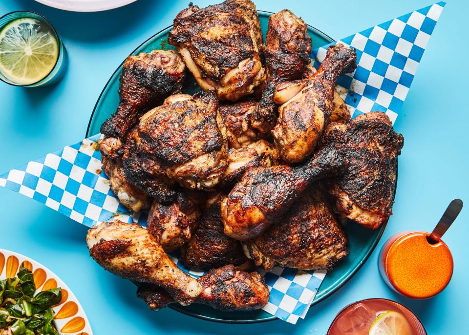 This spiced <em>and</em> spicy jerk chicken recipe comes from a bygone Oakland, California, institution, Miss Ollie’s. Traditional jerk grilling calls for pimento wood, but hardwood or briquettes will do. <a href="https://www.bonappetit.com/recipe/miss-ollies-jerk-chicken?mbid=synd_yahoo_rss" rel="nofollow noopener" target="_blank" data-ylk="slk:See recipe.;elm:context_link;itc:0" class="link ">See recipe.</a>