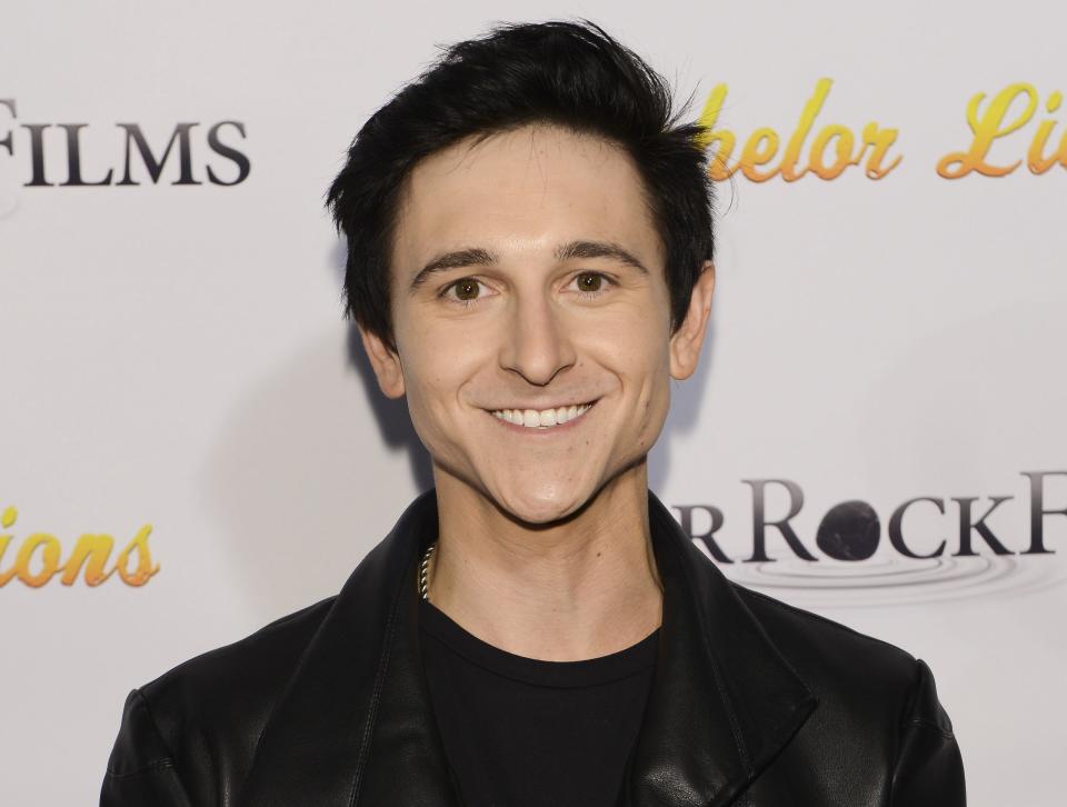 Mitchel Musso smiling