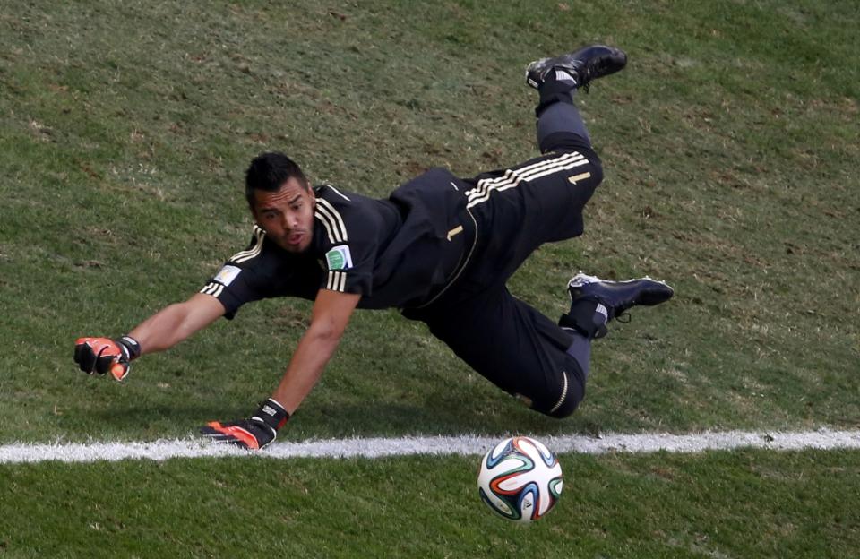 Argentina's goalkeeper Sergio Romero saves a shot during their 2014 World Cup quarter-finals against Belgium at the Brasilia national stadium in Brasilia July 5, 2014. REUTERS/David Gray