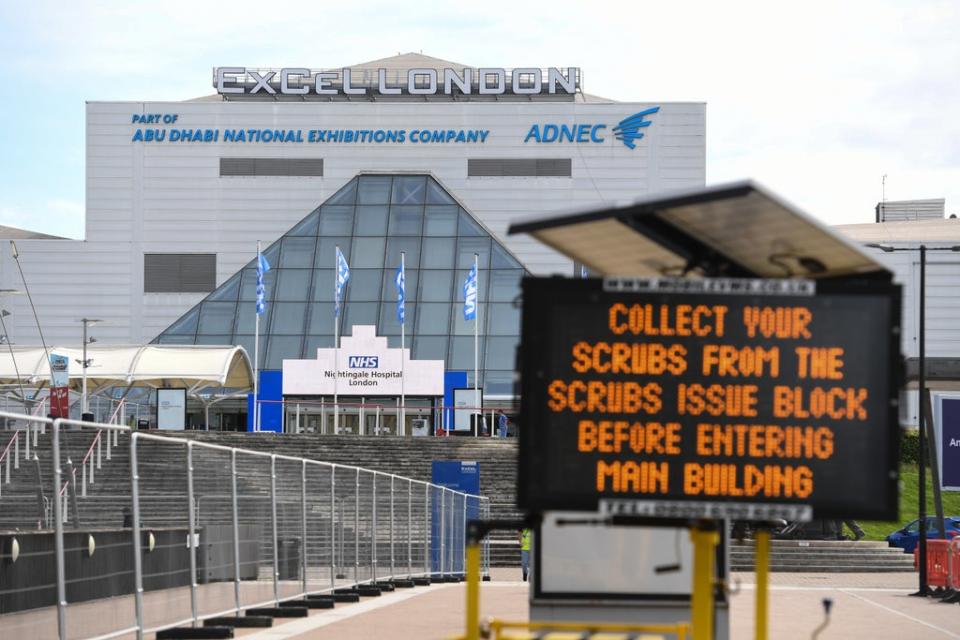 Signage advising NHS workers where to collect scrubs from at the NHS Nightingale Hospital at the ExCel centre in London (Kirsty O’Connor/PA) (PA Archive)