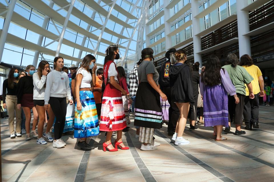 People take part in a stomp dance during the Indigenous Peoples Day celebration in 2021 at the First Americans Museum in Oklahoma City.