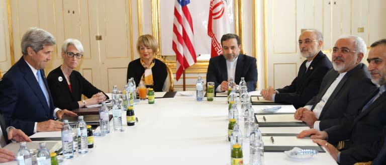 US Secretary of State John Kerry (L) and Under Secretary for Political Affairs Wendy Sherman (2ndL) attend a meeting with Iranian Foreign Minister Javad Zarif (2ndR) in Vienna, Austria, on June 30, 2015