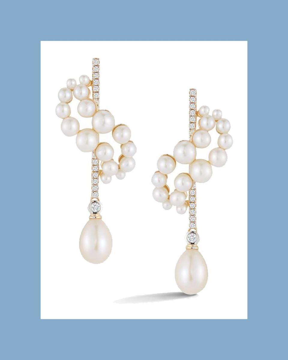 <p><a href="https://mateonewyork.com/collections/earrings/products/pearl-curve-form-earrings-with-drops" rel="nofollow noopener" target="_blank" data-ylk="slk:Shop Now;elm:context_link;itc:0;sec:content-canvas" class="link ">Shop Now</a></p><p>14kt Gold Pearl Curve Form Earrings </p><p>$3875.00</p><p>mateonewyork.com</p><span class="copyright">Mateo</span>