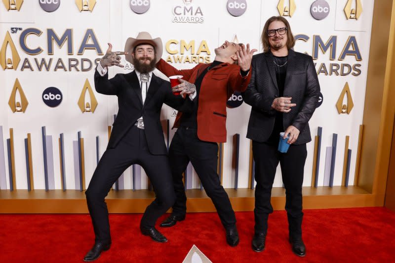 Post Malone, Morgan Wallen and Hardy, from left to right, attend the CMA Awards in 2023. File Photo by John Angelillo/UPI