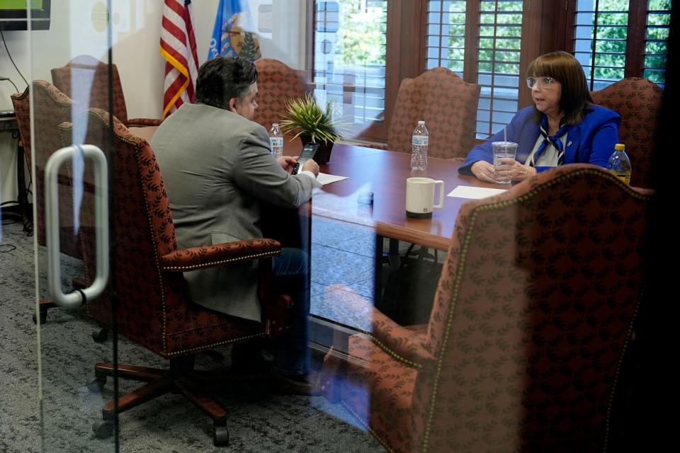 Rep. Jacob Rosecrants, left, and Sen. Mary Boren talk as they wait for the Oklahoma State Board of Education to finish an executive session during a board of education meeting in Oklahoma City, Wednesday, July 31, 2024.