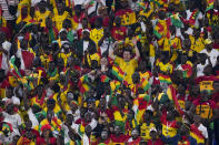 Fans of Ghana cheer during a World Cup group H soccer match against Portugal at the Stadium 974 in Doha, Qatar, Thursday, Nov. 24, 2022. (AP Photo/Manu Fernandez)
