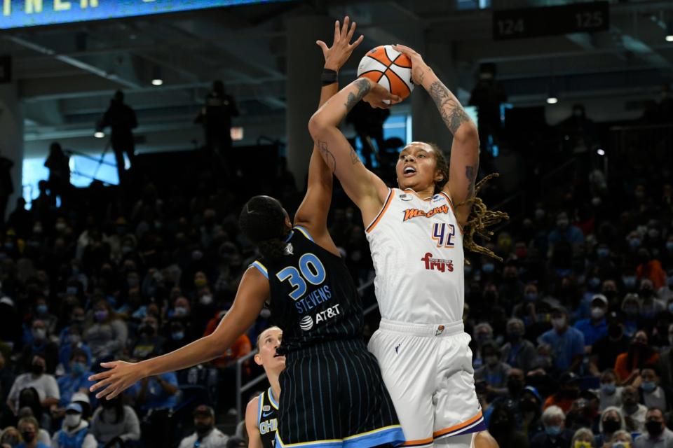 Phoenix Mercury's Brittney Griner (42) shoots against Chicago Sky's Azura Stevens (30) during the first half of Game 4 of the WNBA Finals, Sunday, Oct. 17, 2021, in Chicago.